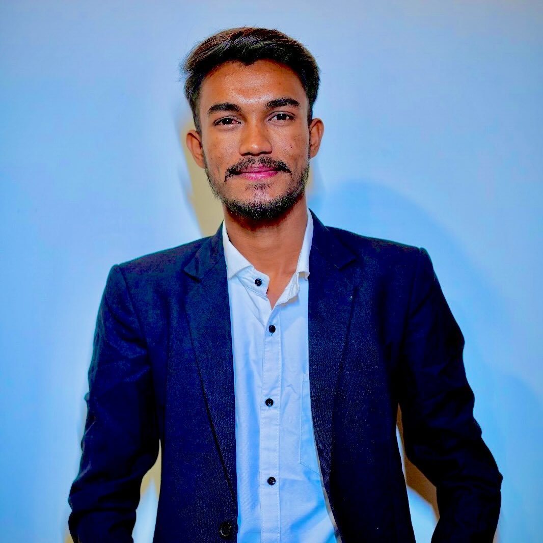 Vijay Chudasama - Founder of GoNo Mall wearing glasses and smiling in professional profile photo